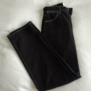 Black jeans with white stitching